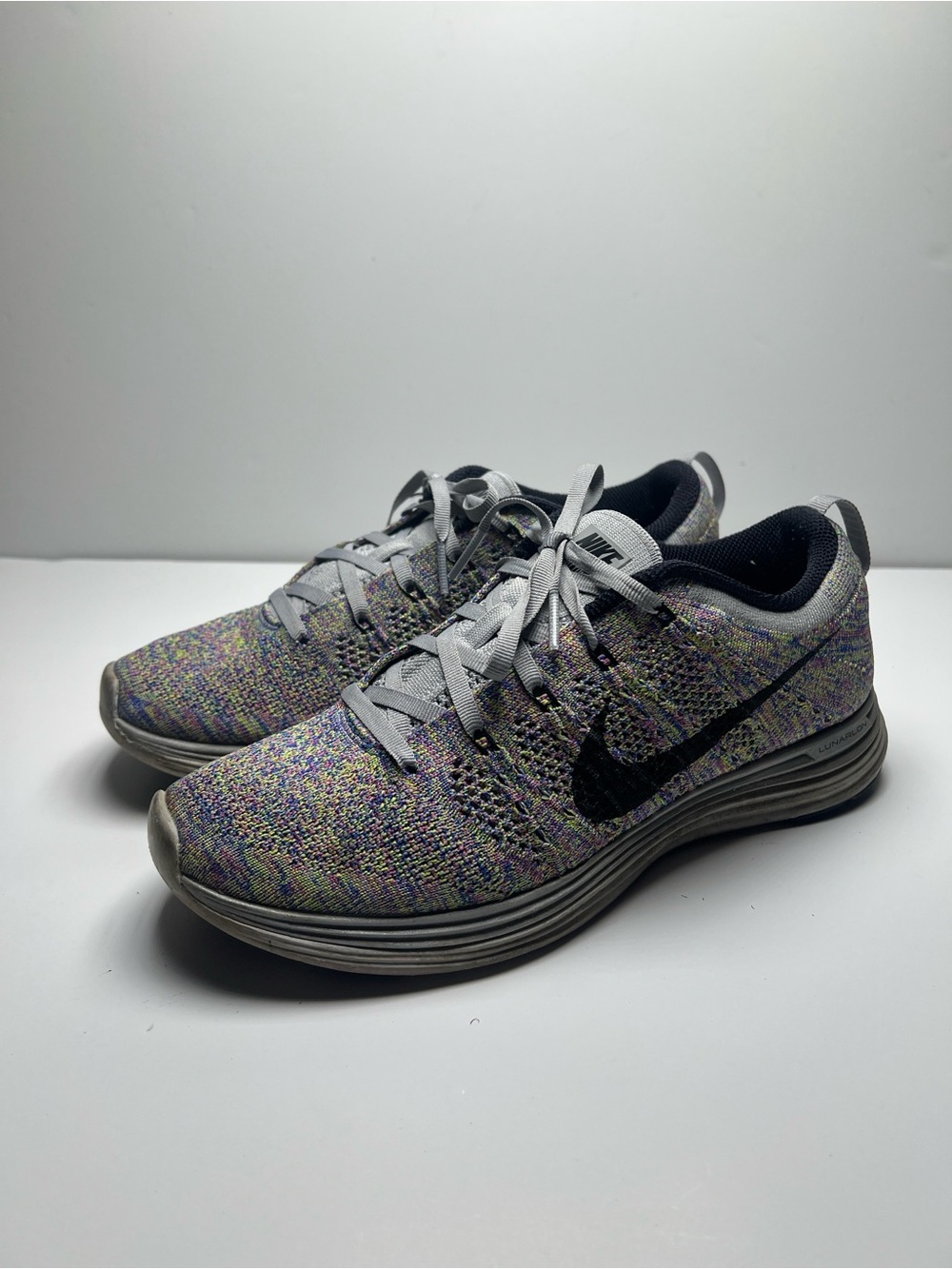Women’s Nike Multicolor Flyknit Running Shoes - size 8